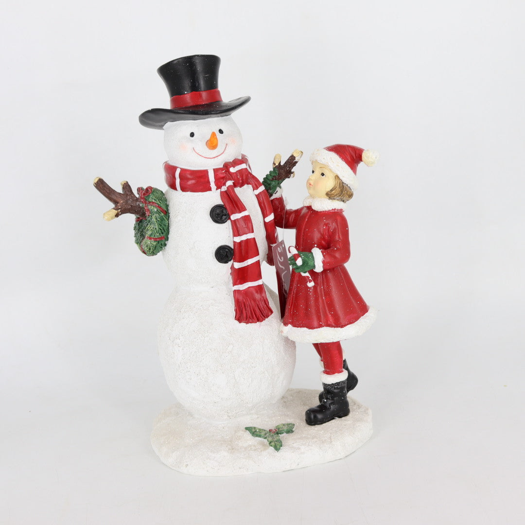 Girl Making Snowman Figurine