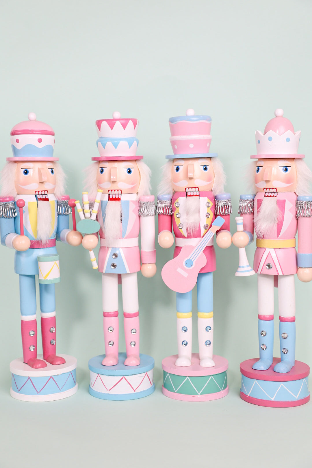 Pastel Nutcracker Holding Musical Instruments
